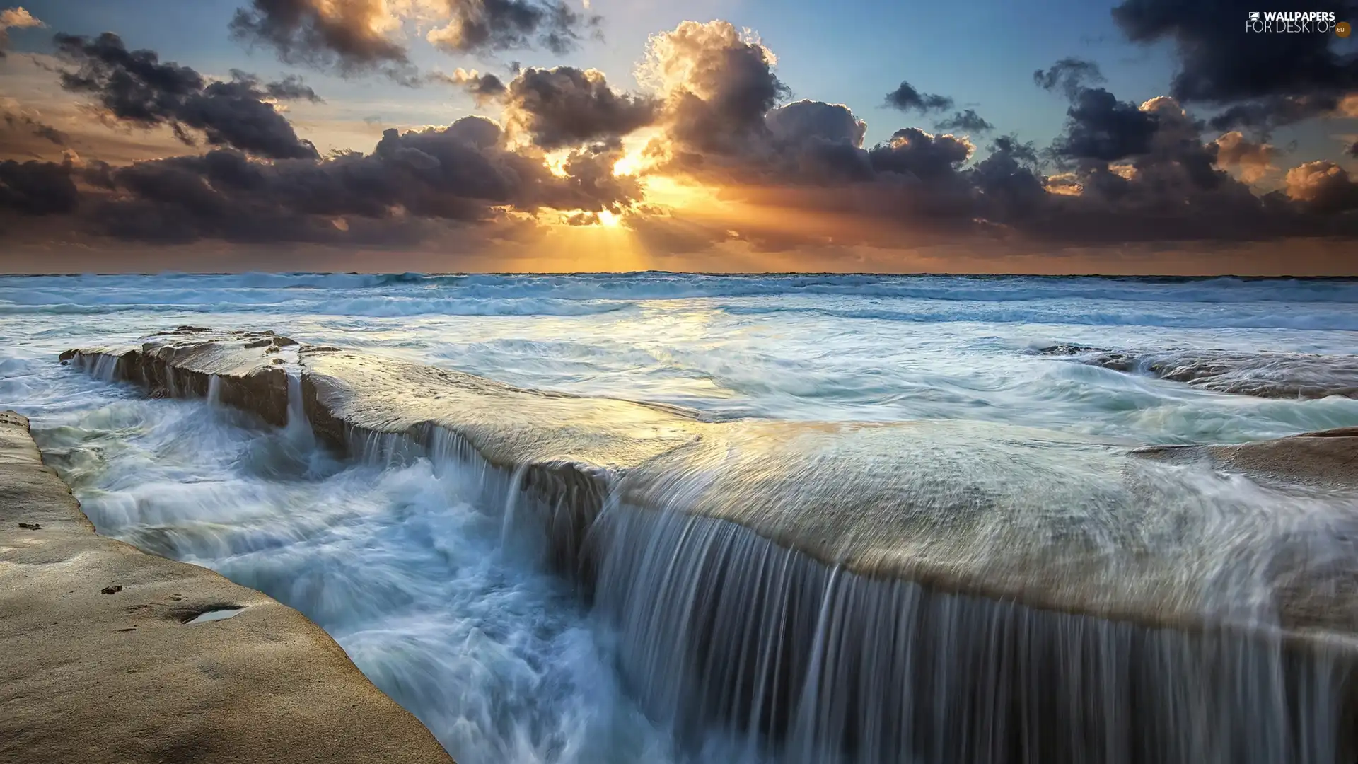 sea, cascade, rays of the Sun, rocks